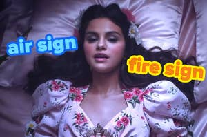 selena gomez lays on a bed