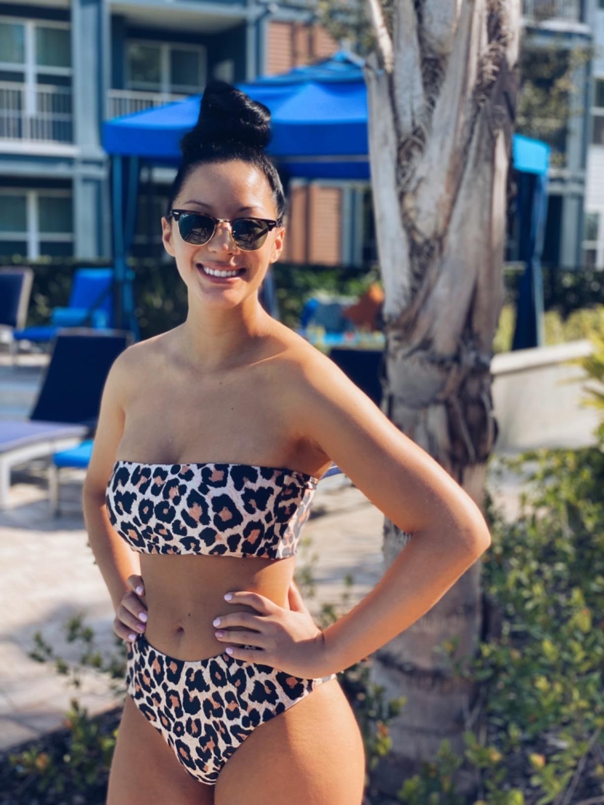 A reviewer in the leopard swimsuit