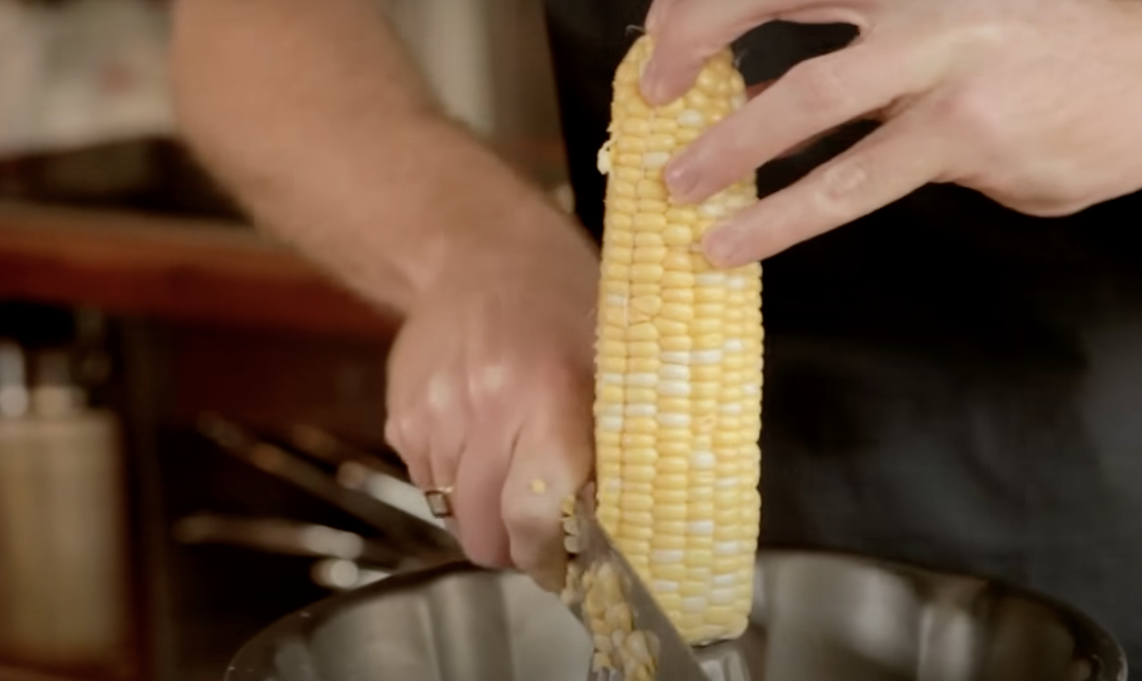 Slicing corn off the cob using a bundt pan.
