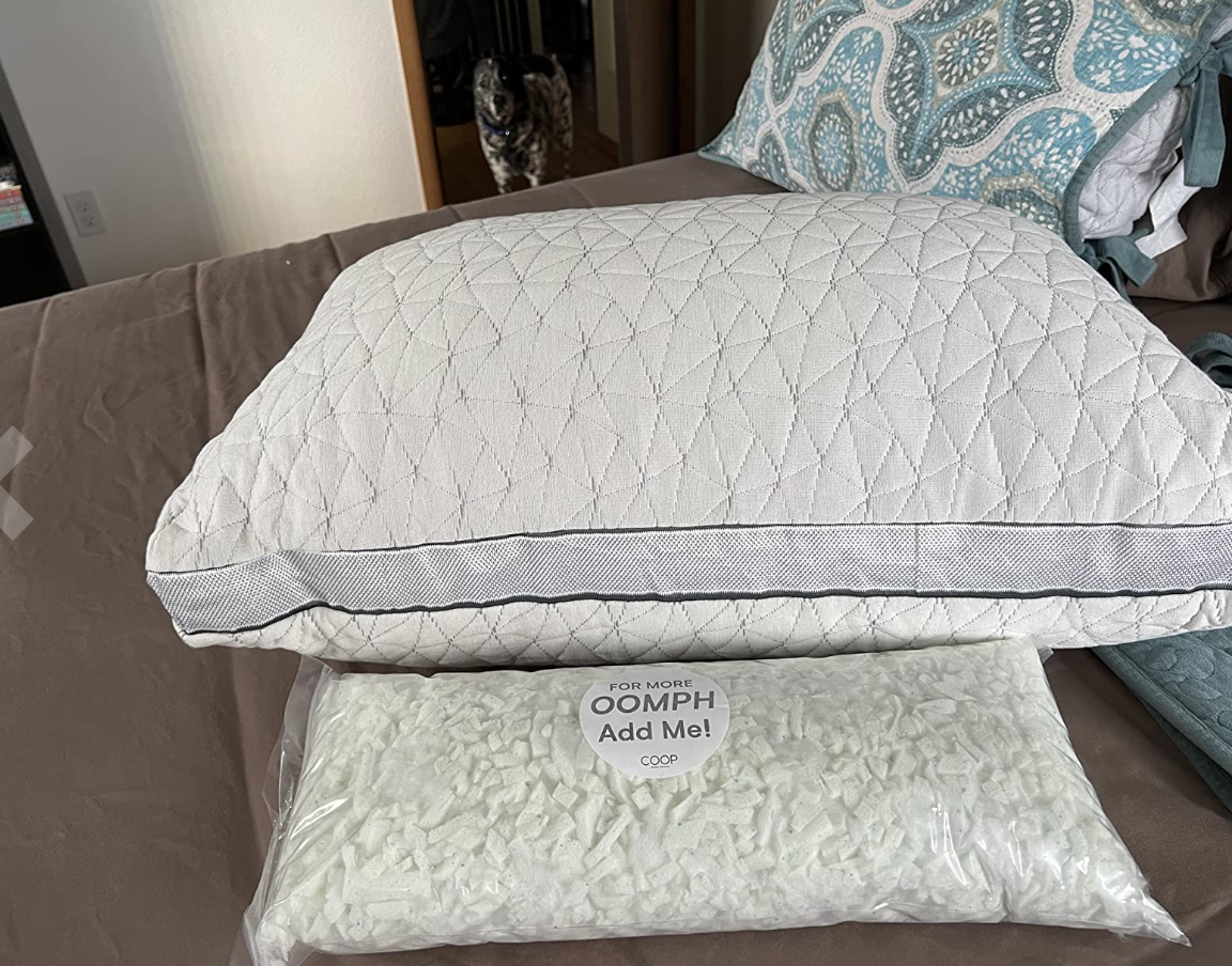 a fluffy COOP pillow alongside a separate package of foam pieces