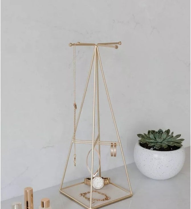the gold pyramid shaped jewelry holder