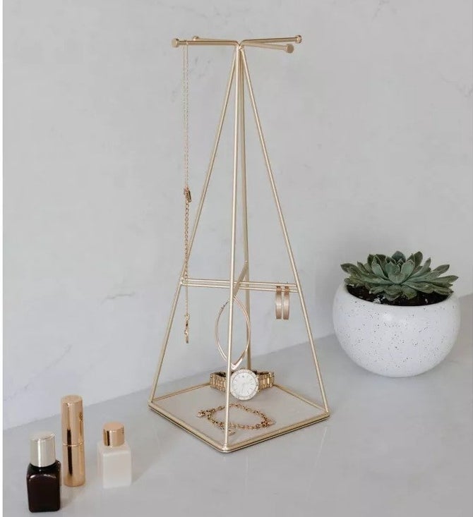 the gold pyramid shaped jewelry holder