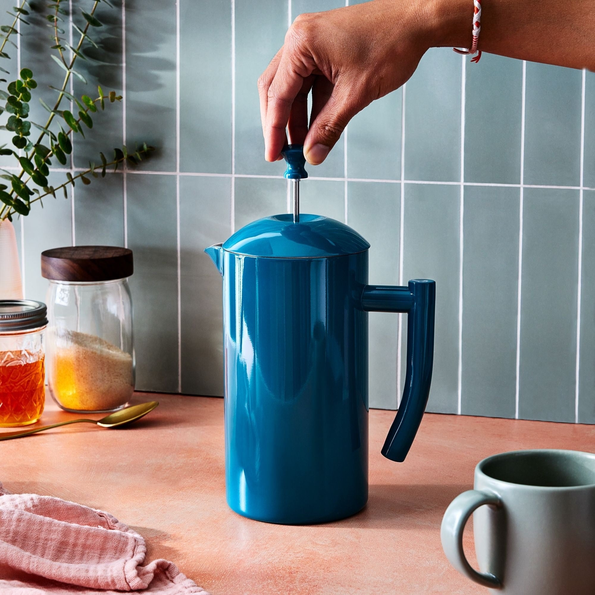 a blue french press