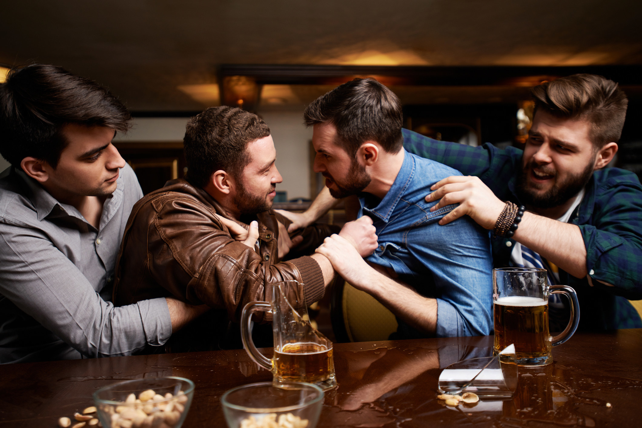 Men fighting in a bar