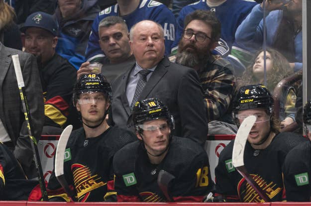 Hockey Coach Bruce Boudreau behind the Vancouver Canucks bench