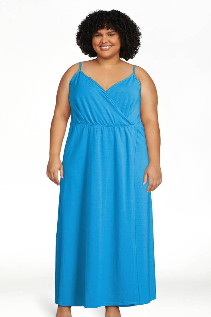 A model wearing a blue dress