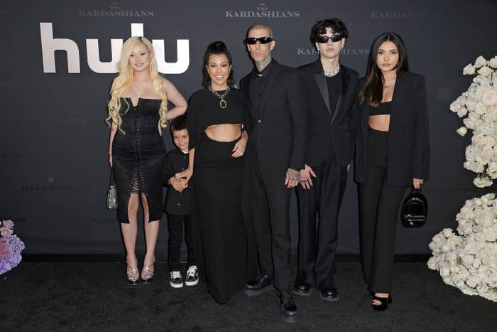 Alabama with her dad, siblings, and step-mom Kourtney Kardashian on the red carpet