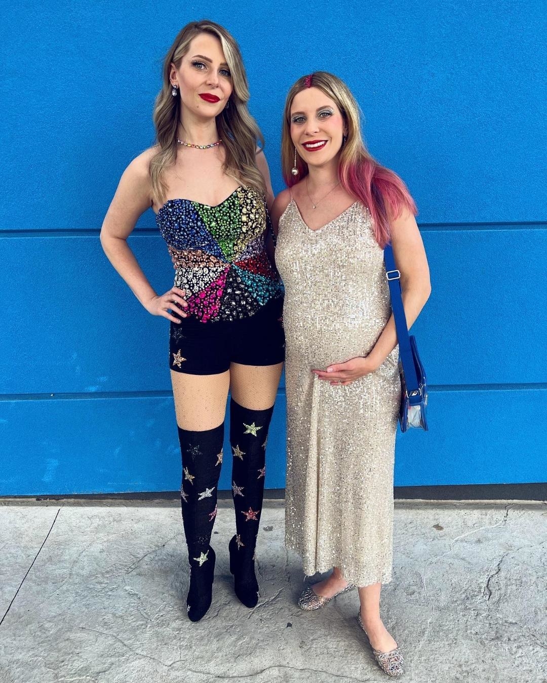 two women wearing bedazzled clothes