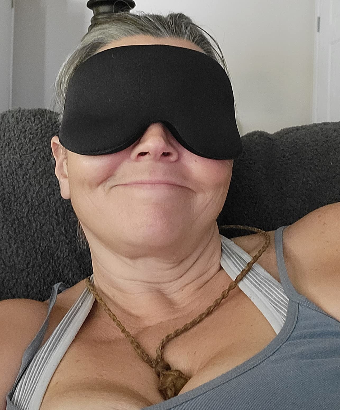 Reviewer wearing the sleep mask