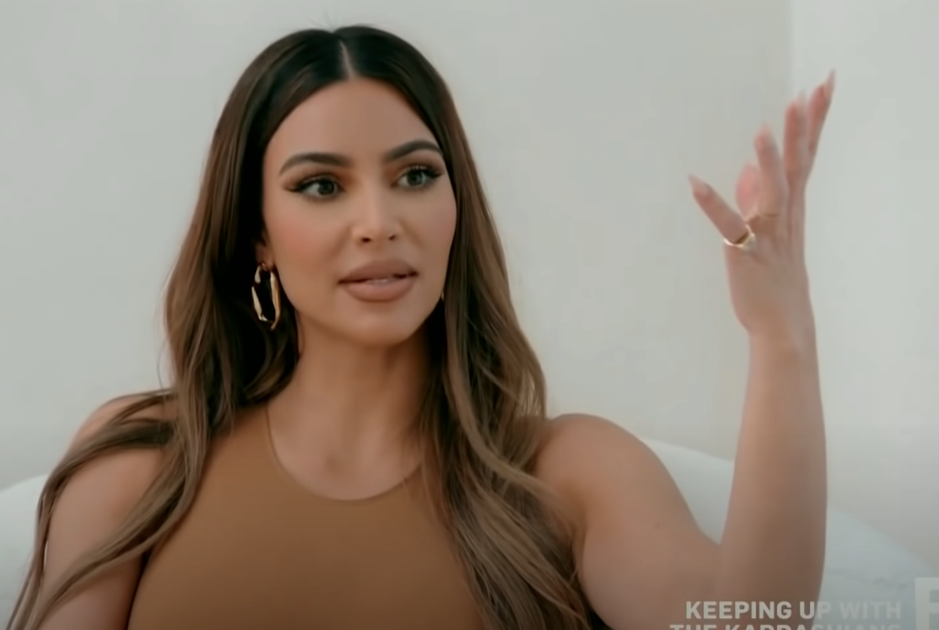 Close-up of Kim gesturing