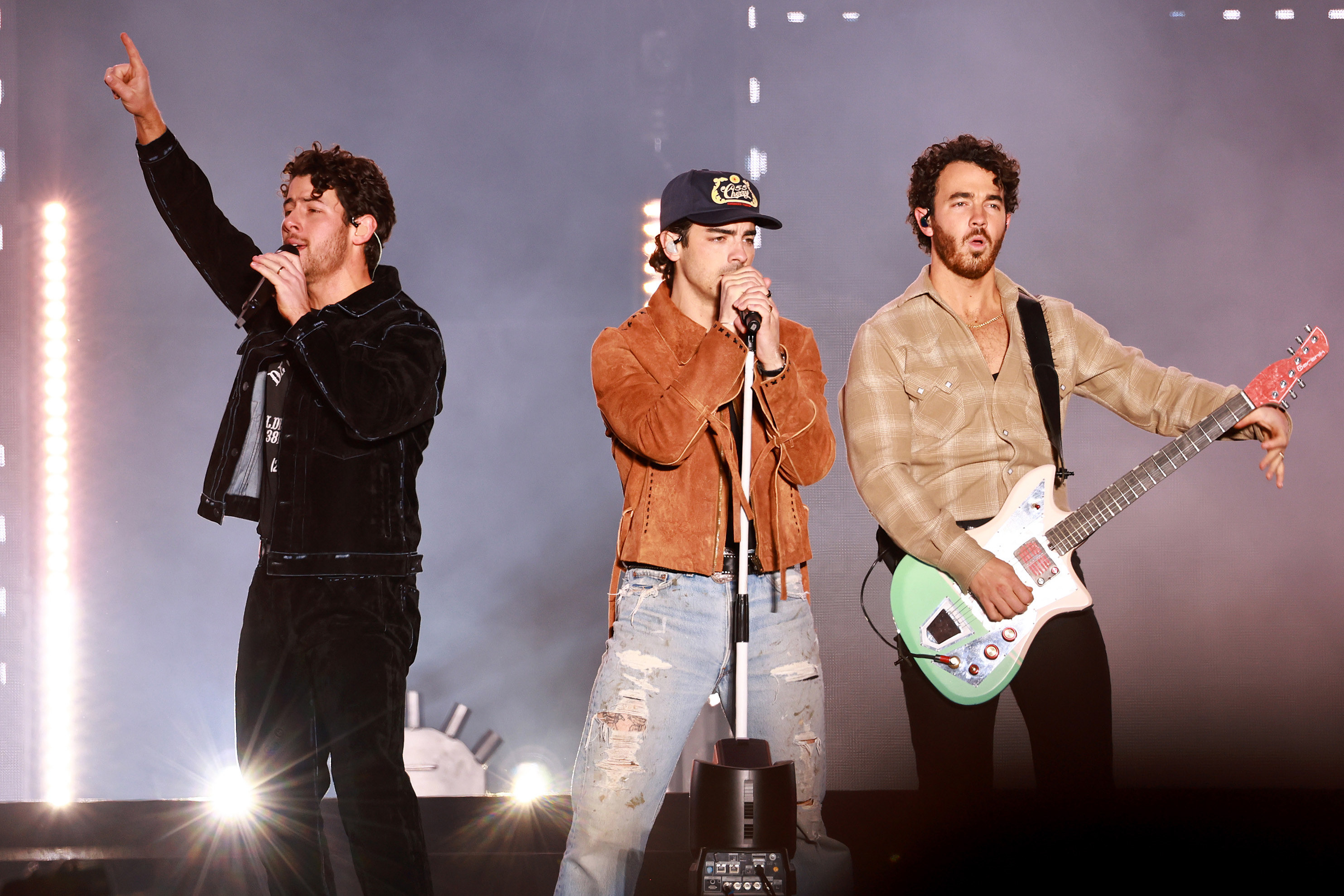 The Jonas Brothers performing onstage