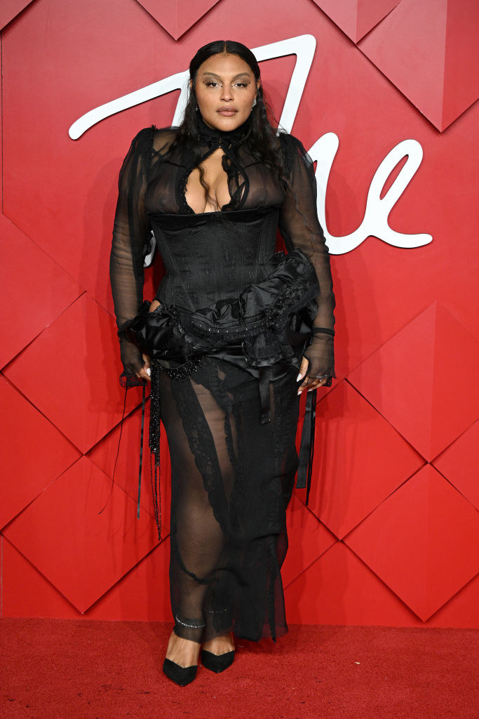 Paloma on the red carpet in the long-sleeved sheer shirt and the long skirt