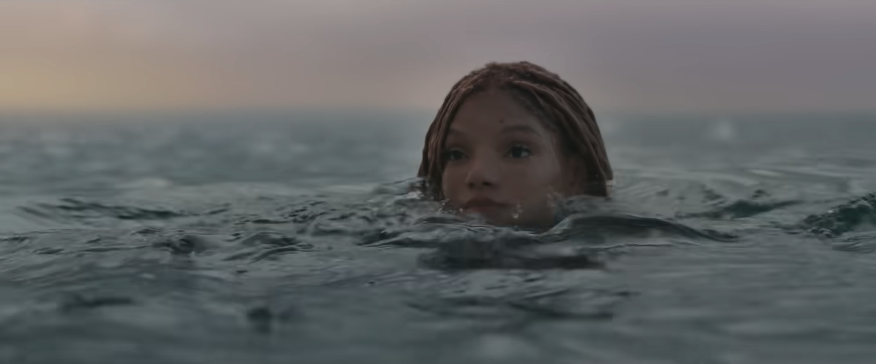 Ariel with her head just above the surface of the sea