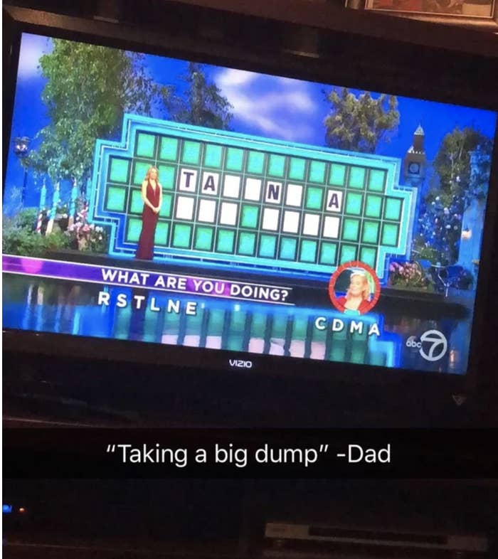 Screenshot of Wheel of Fortune letters, with hint question   "What are you doing?" on  with Dad's reply  — "Taking a large  dump” — successful  a caption underneath