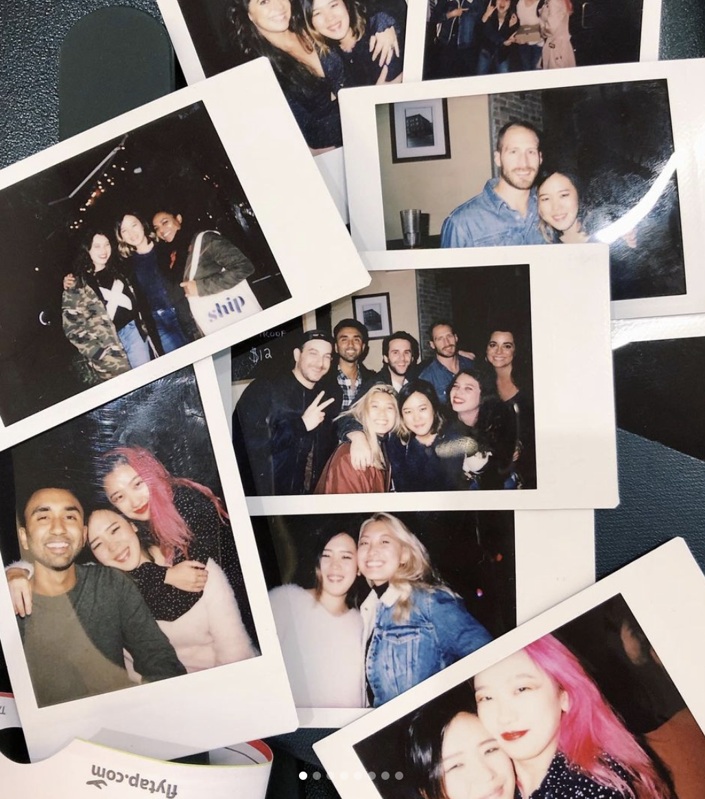 An array of Polaroid photos of groups of smiling people