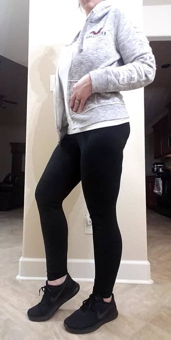 a reviewer wearing the leggings in black