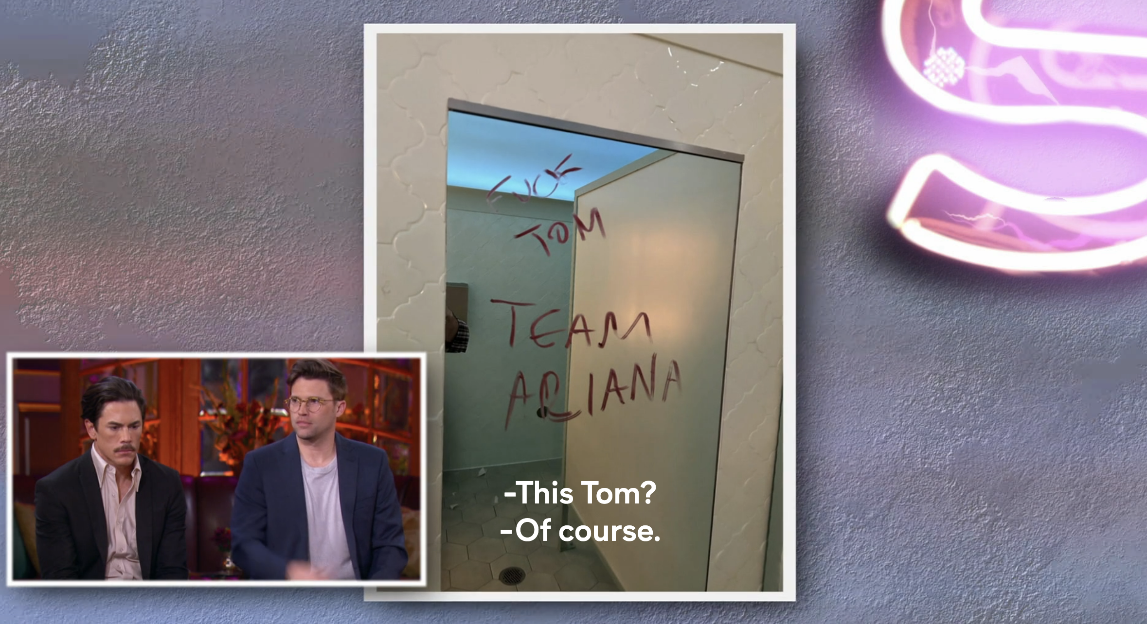 The bathroom mirror at Tom&#x27;s bar with &quot;Team Ariana&quot; scrawled on it in lipstick