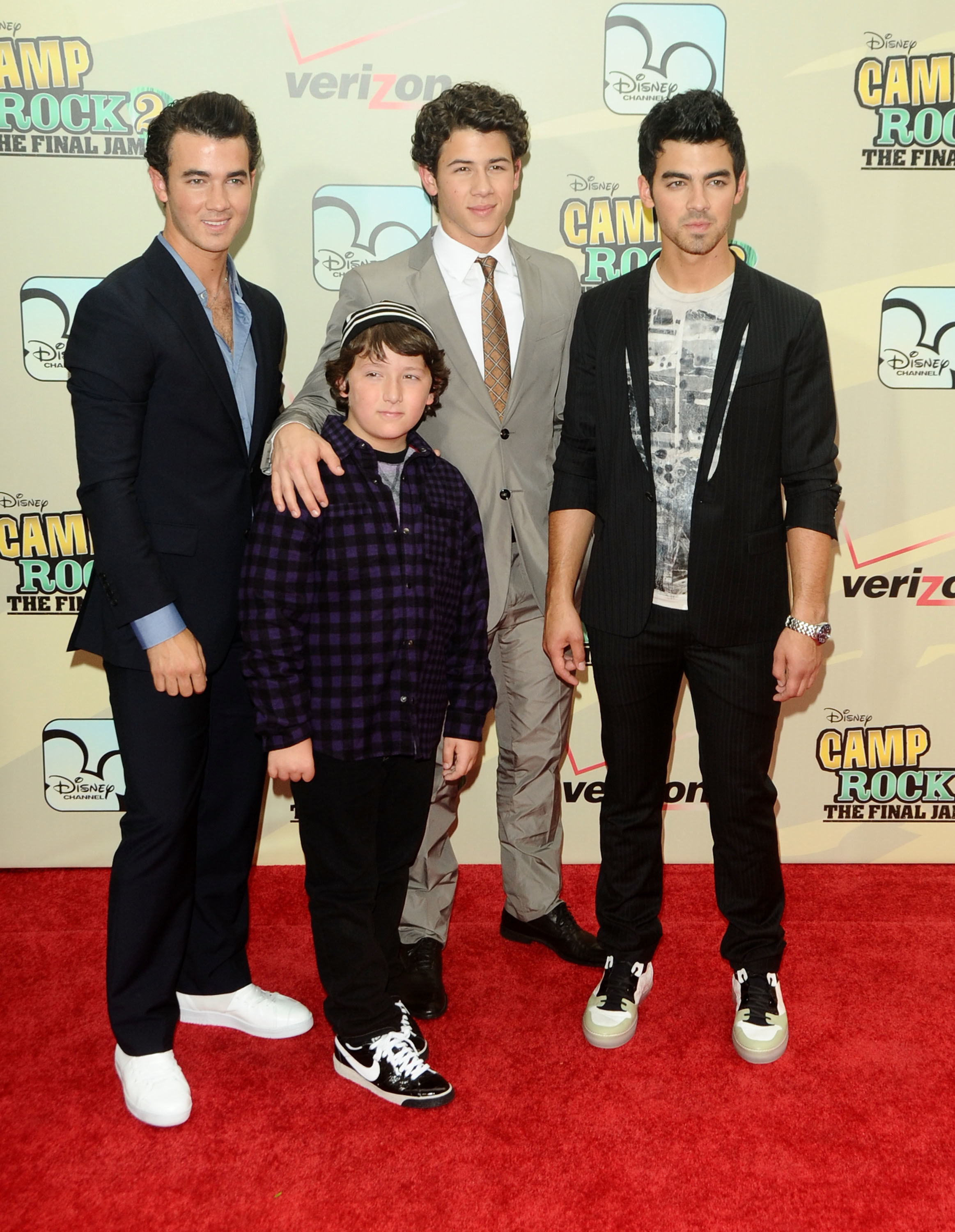 older photo of all 4 on the red carpet