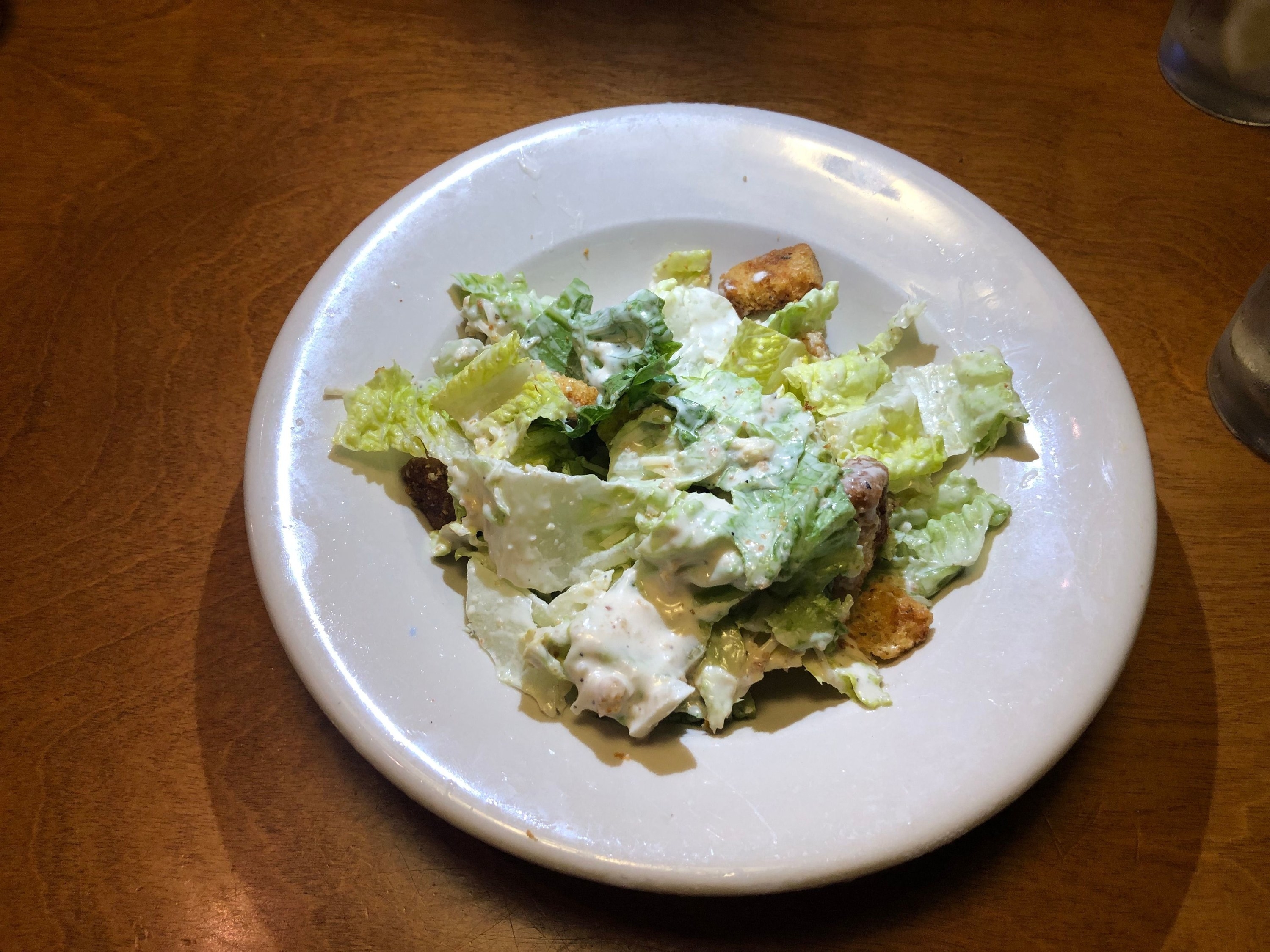 Caesar side salad with lots of dressing from Texas Roadhouse