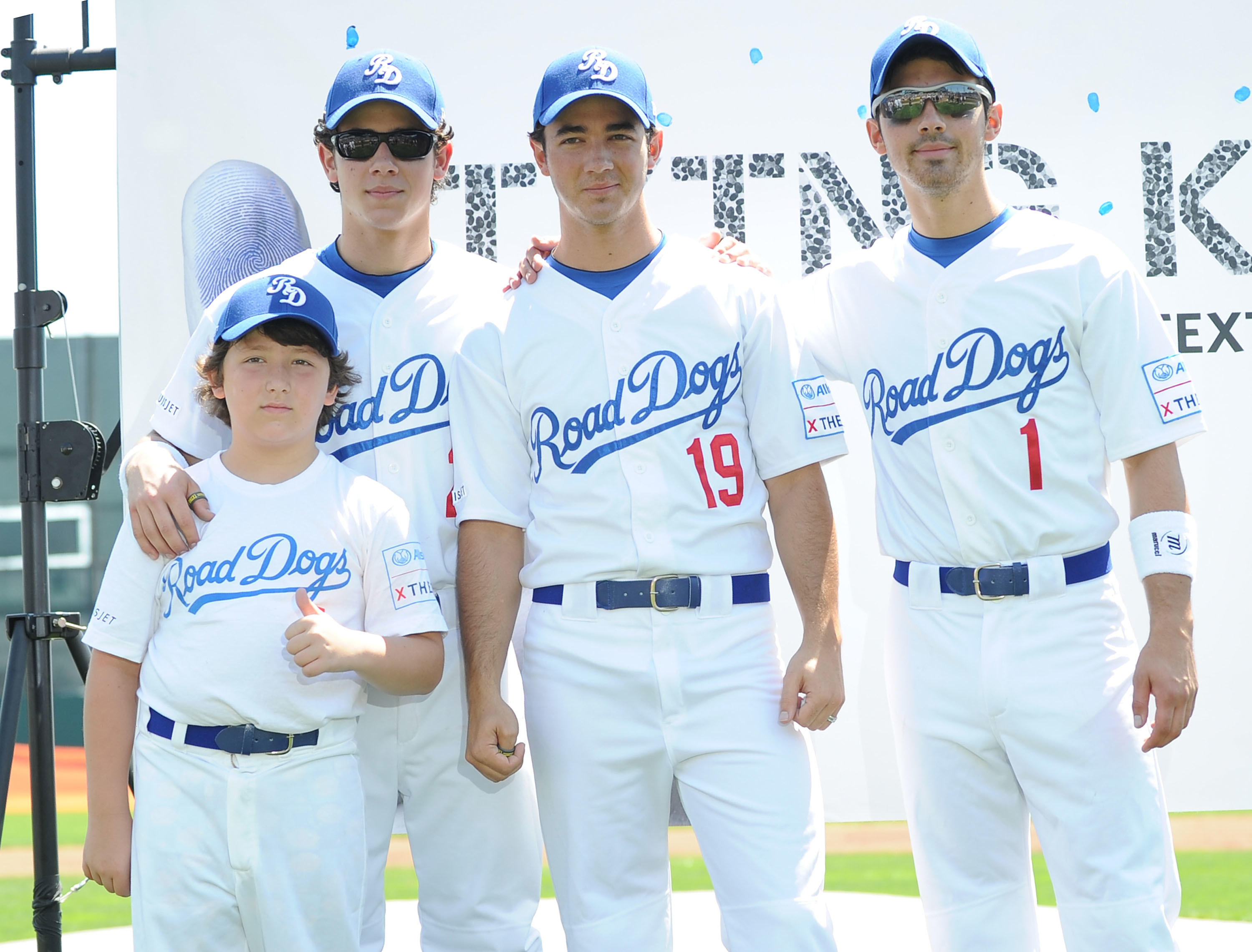 the brothers in baseball uniforms