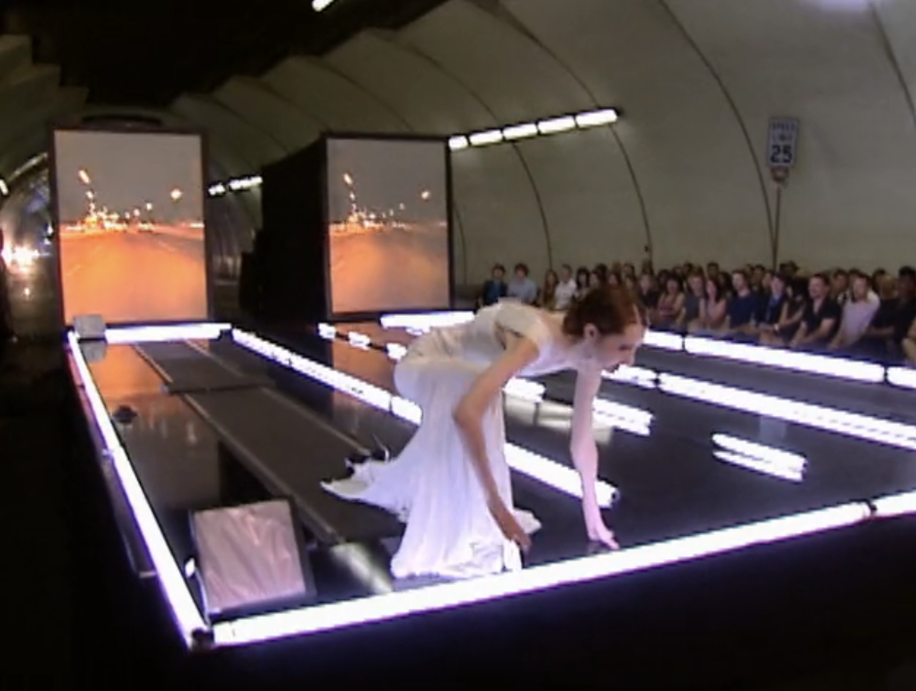 A contestant falling on the runway