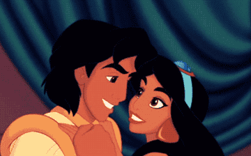 Gif of Disney's Aladdin and Jasmine hugging