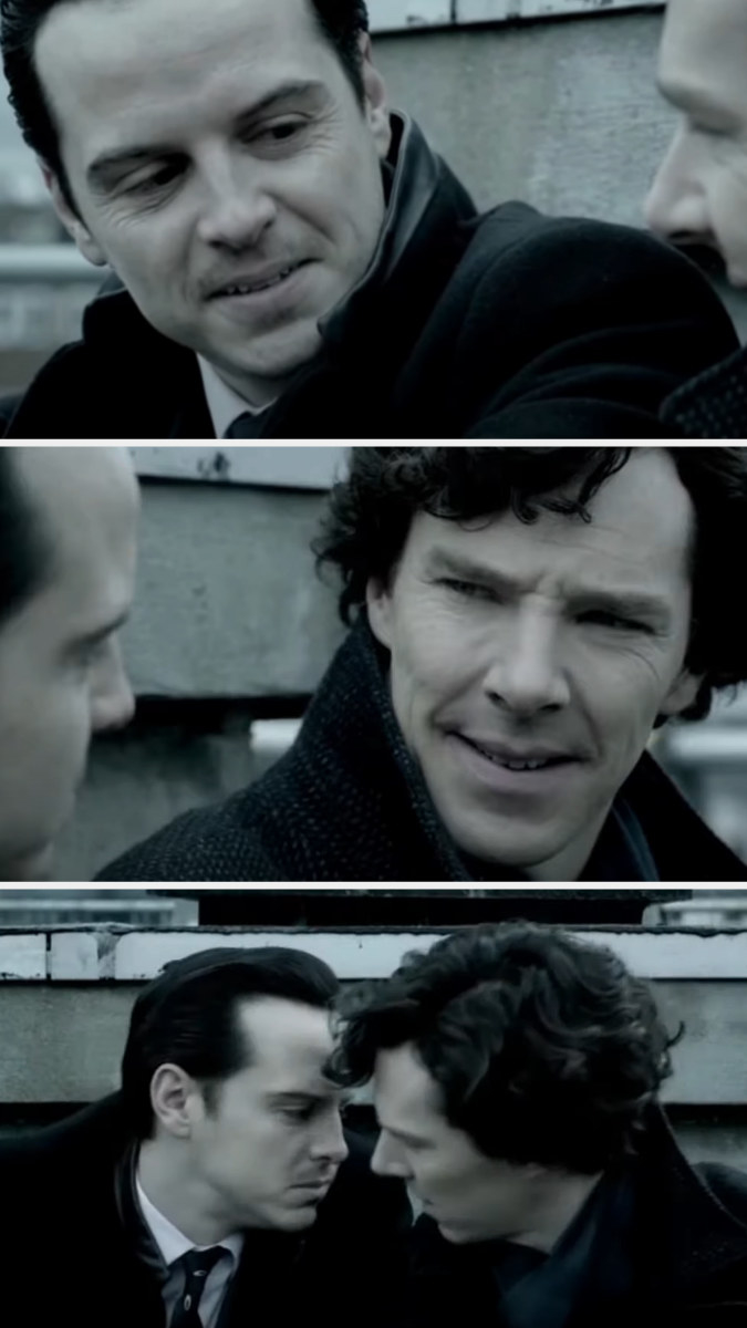Moriarty and Sherlock leaning in for a kiss
