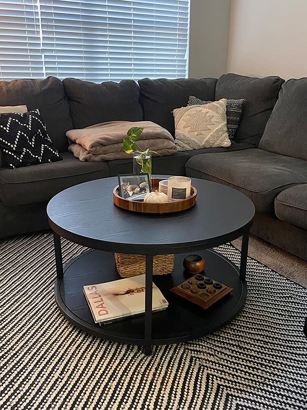 Reviewer image of the black coffee table in their living room