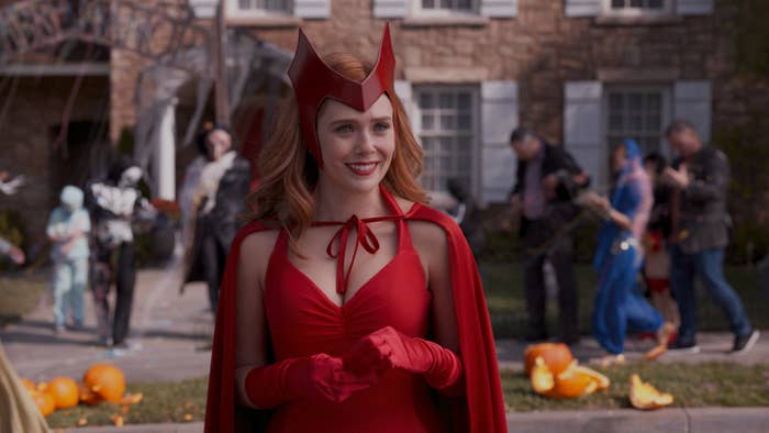 Elizabeth Olsen as Wanda Maximoff in the middle of a town