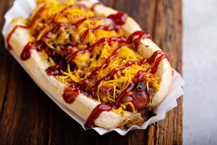 chili dog covered in cheese