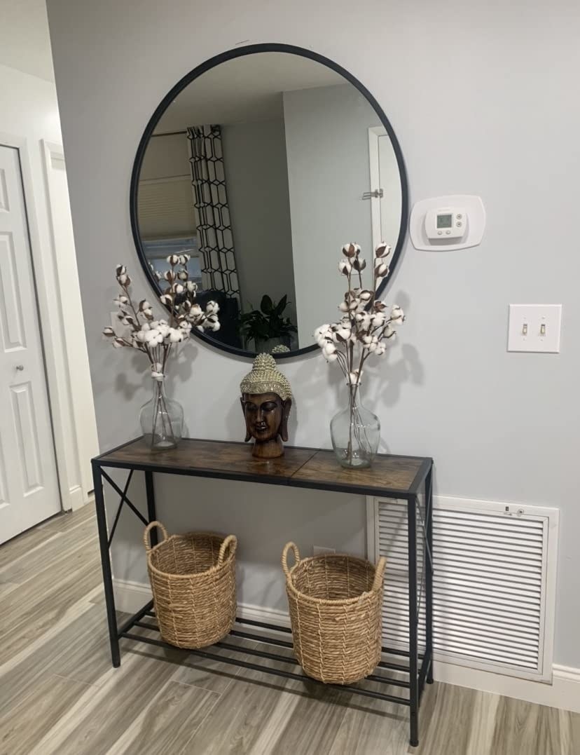 Reviewer photo of the console table with decor on top