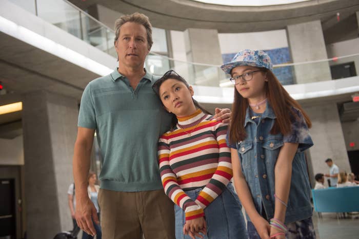 John Corbett with his arm around Lana Condor as they stand next to Anna Cathcart in To All the Boys I&#x27;ve Loved Before