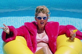 Taylor Swift floating in a pool in the You Need to Calm Down music video