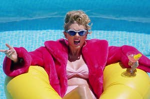 Taylor Swift floating in a pool in the You Need to Calm Down music video