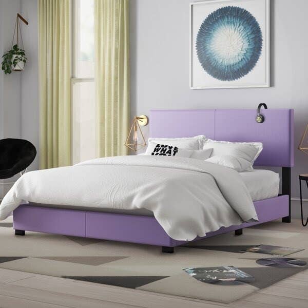 Purple bed in a room