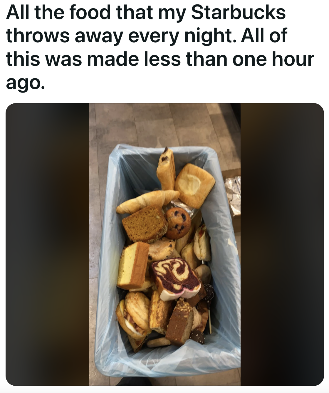 The bin is full of bread and pastries, with a caption that says they were all made less than an hour ago