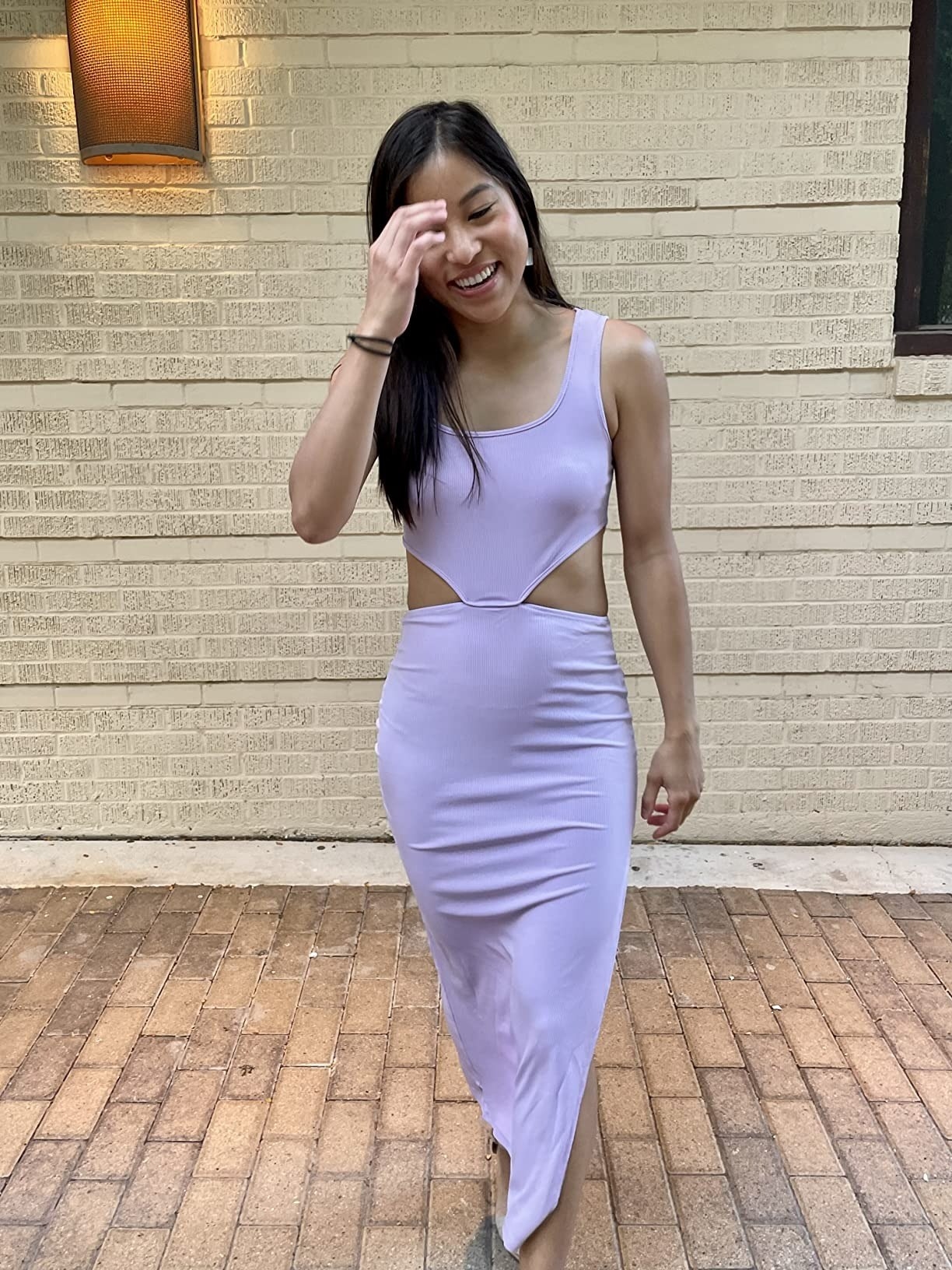 A reviewer in the lavender midi