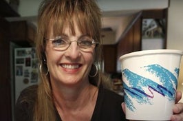 Gina holding a jazz cup
