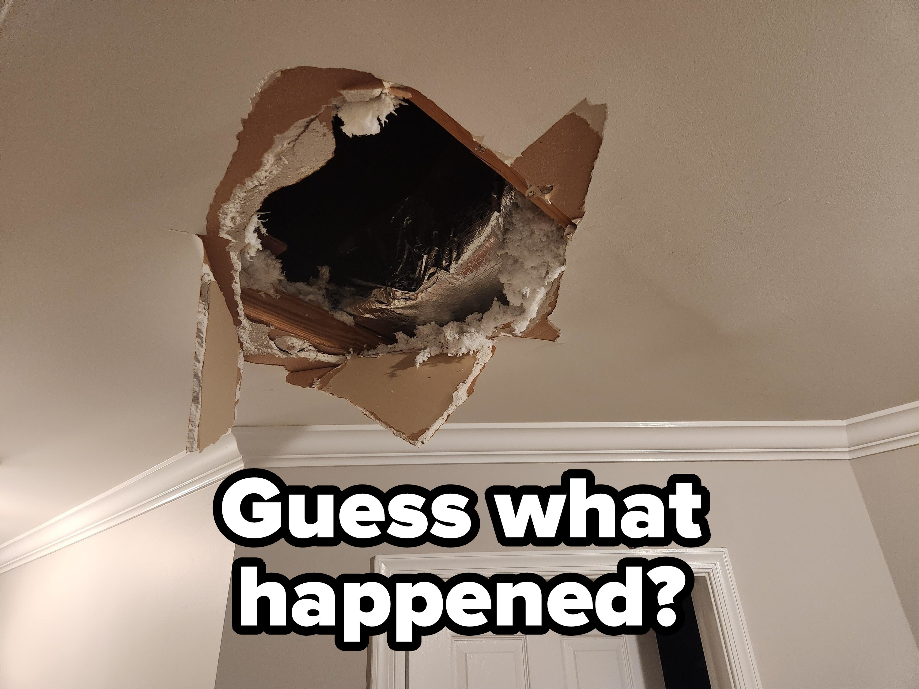 A big hole in a ceiling from the attic
