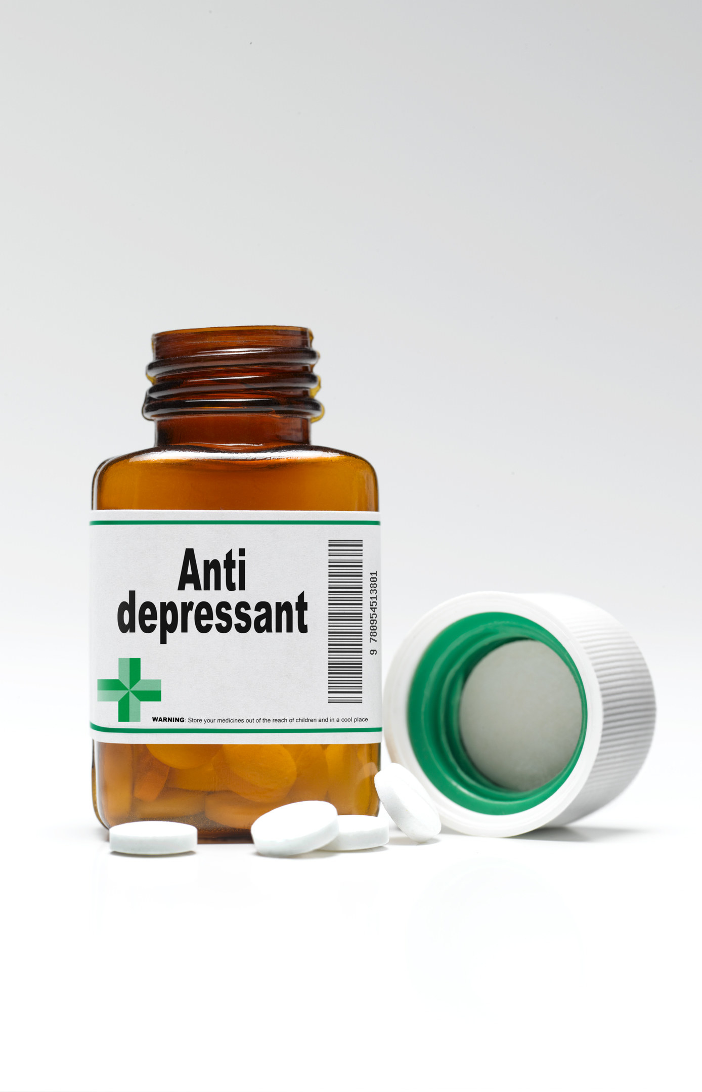 An open bottle of pills that is labeled "Anti depressant"
