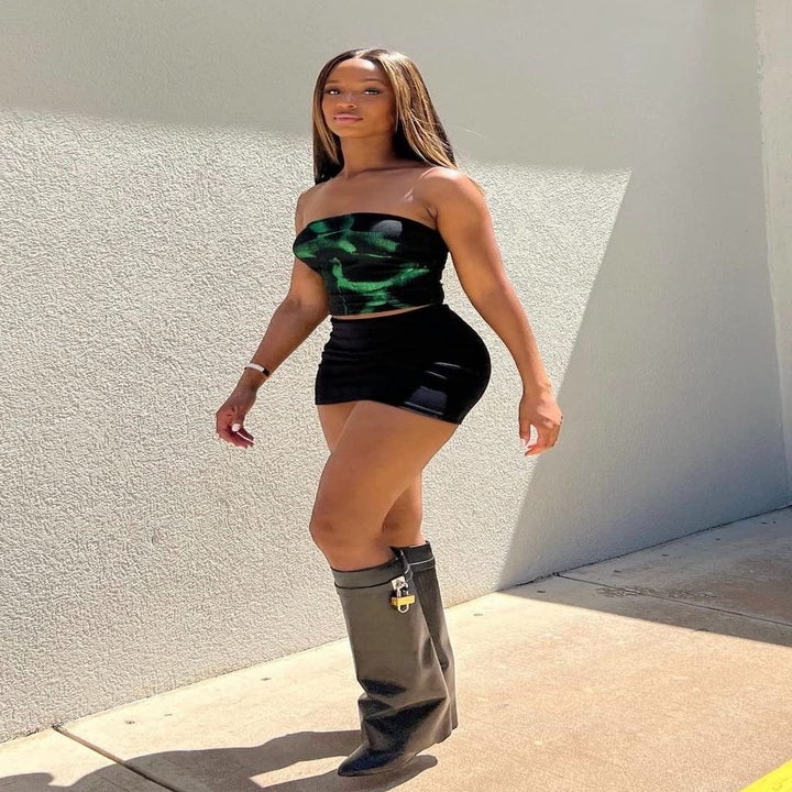 Reviewer wearing the black skirt