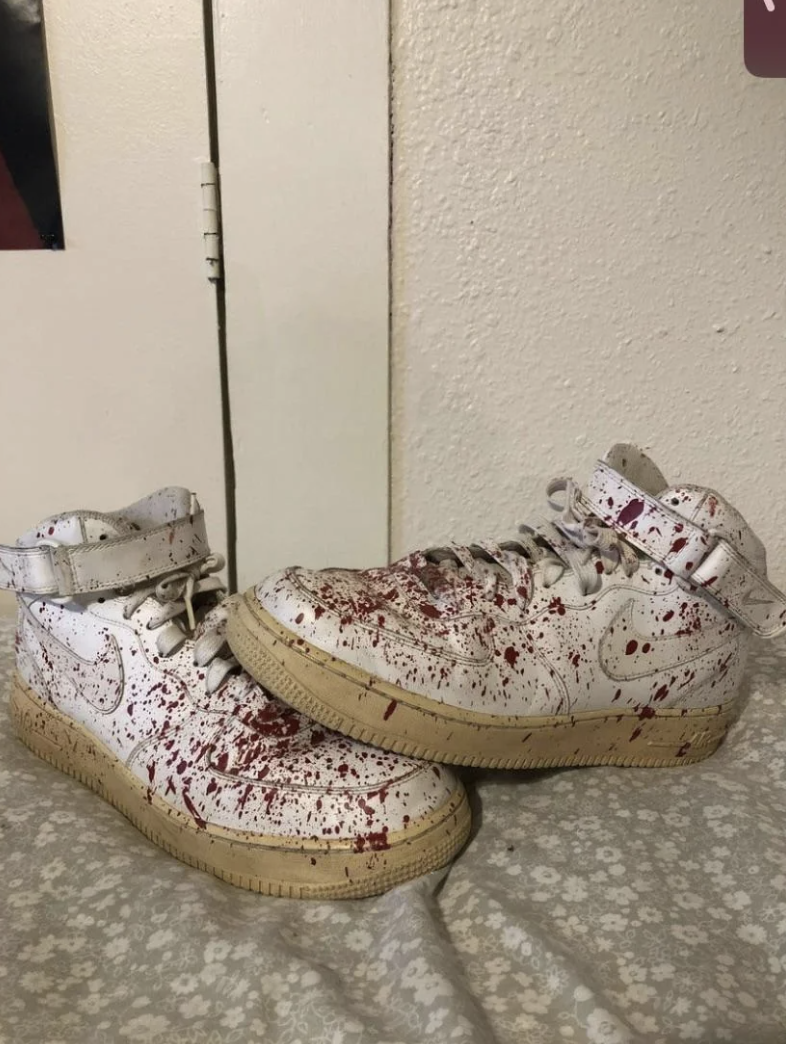 What looks like blood on a pair of sneakers
