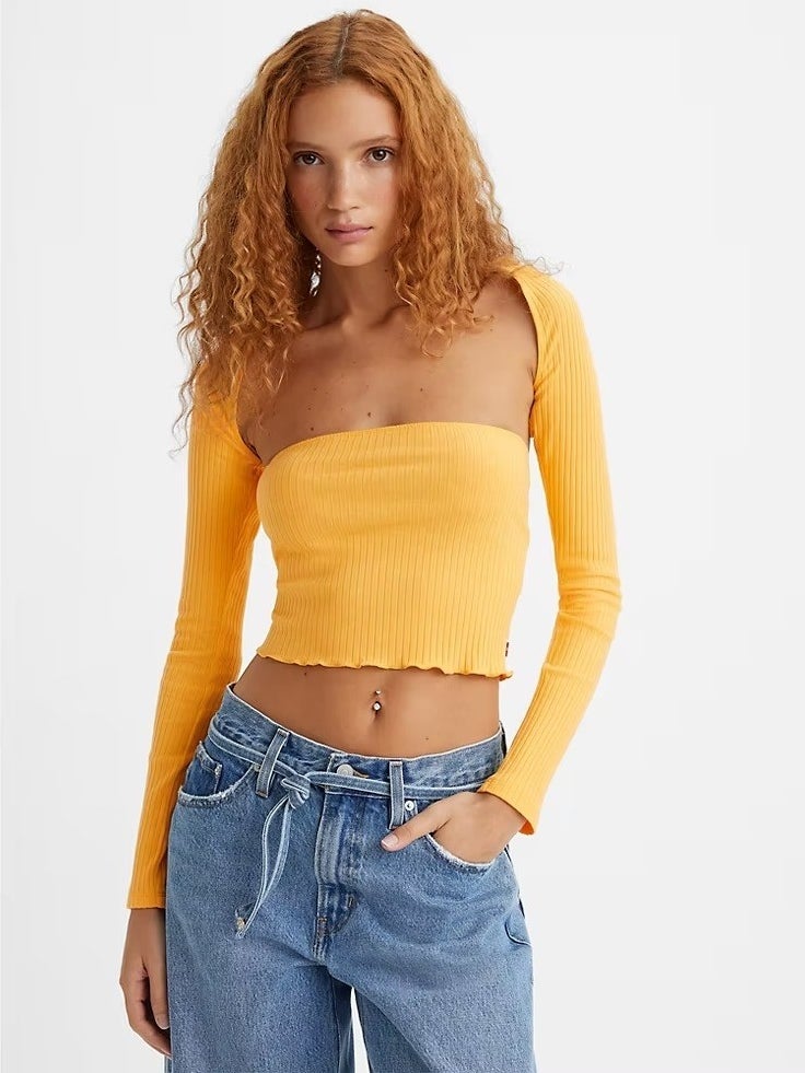 A model in the tangerine top