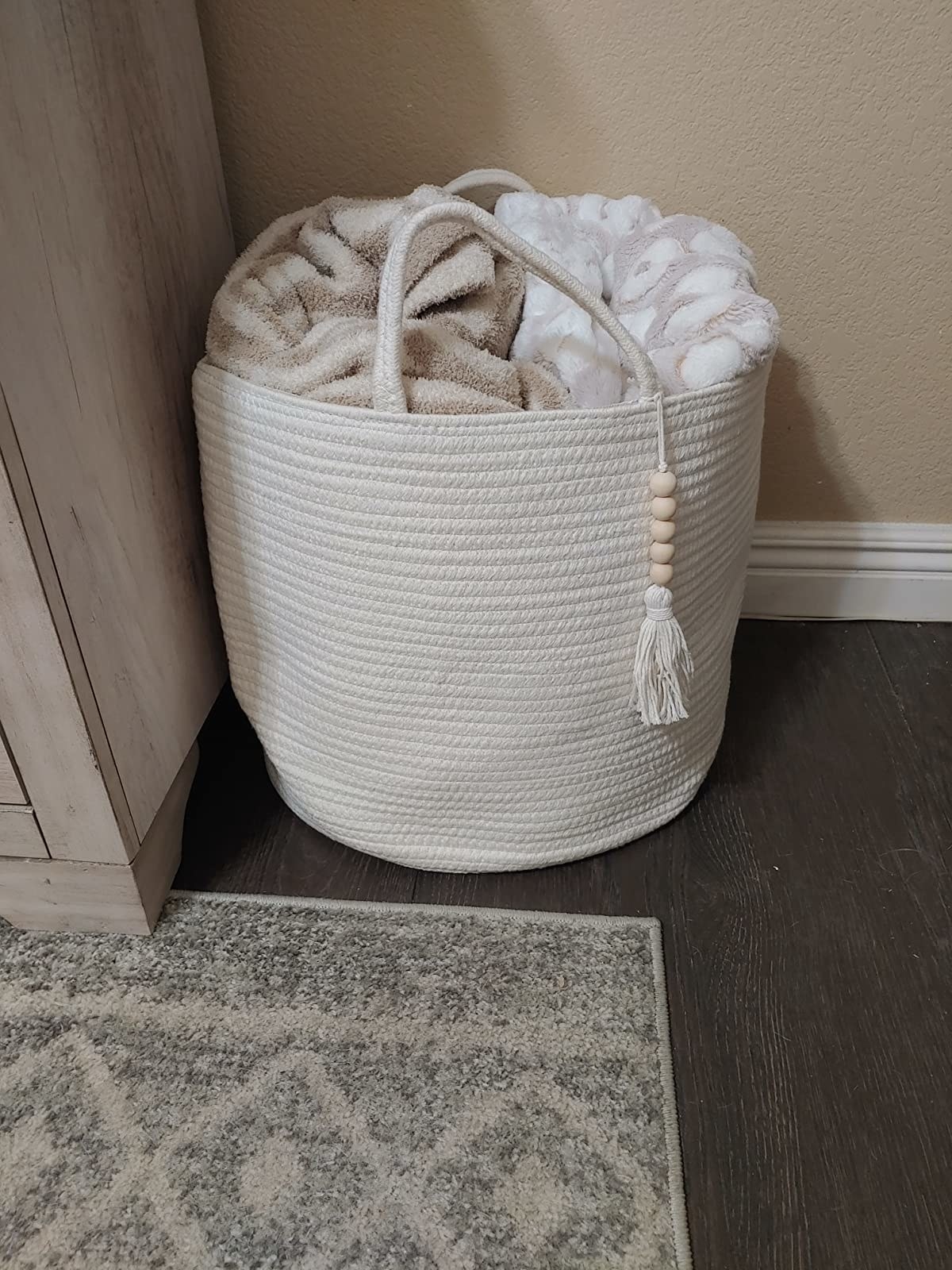 Reviewer image of the basket with blankets in it
