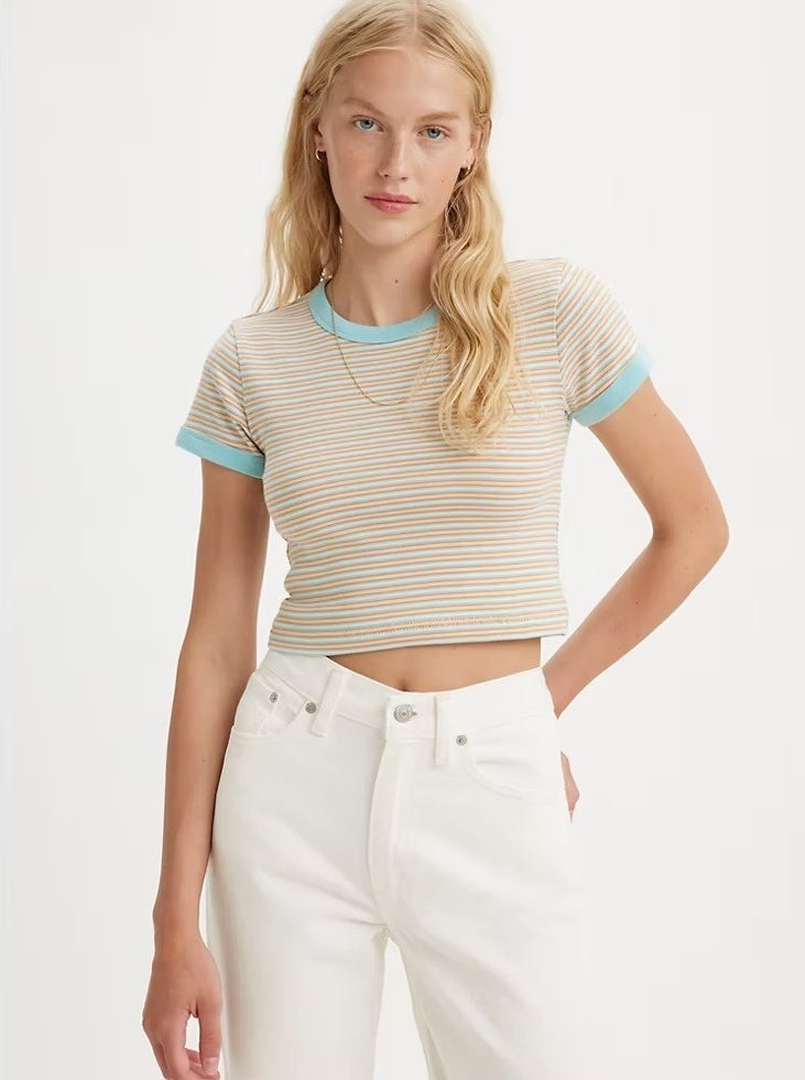 A model in the light blue and blush crop top