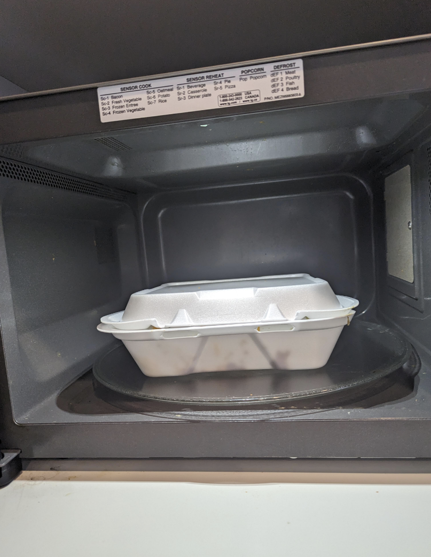 A styrofoam plate in the microwave