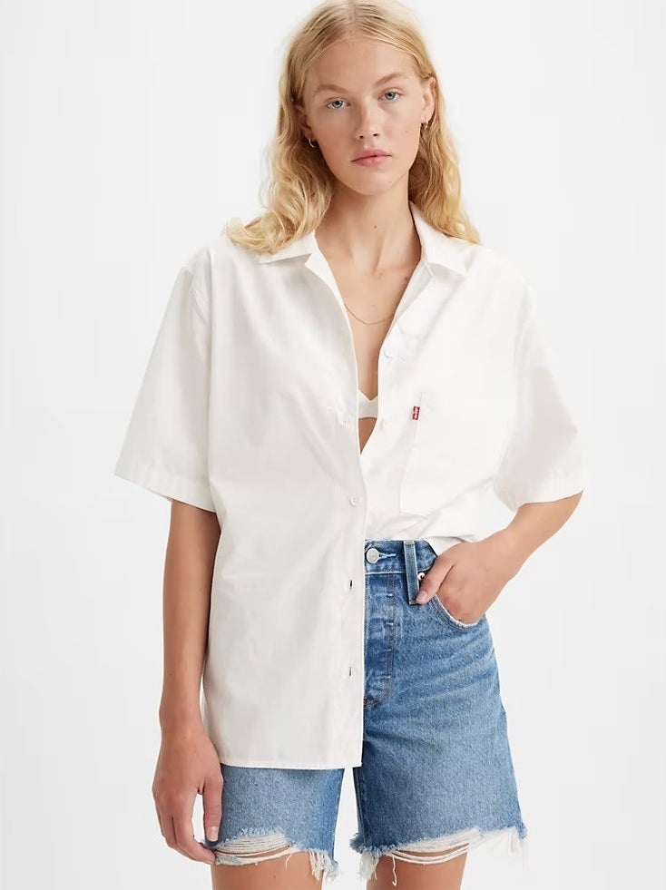 A model in the white button-up