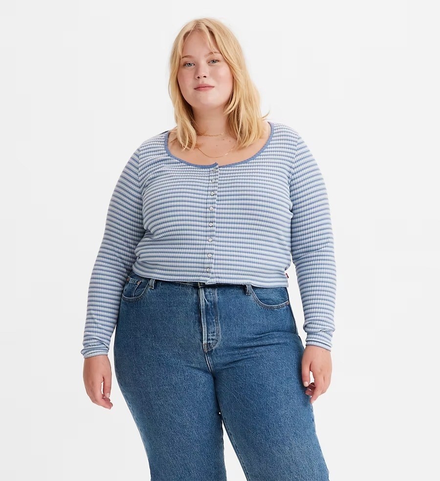 A model in the printed blue tee