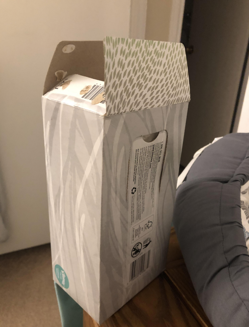 A box of tissues opened from the side