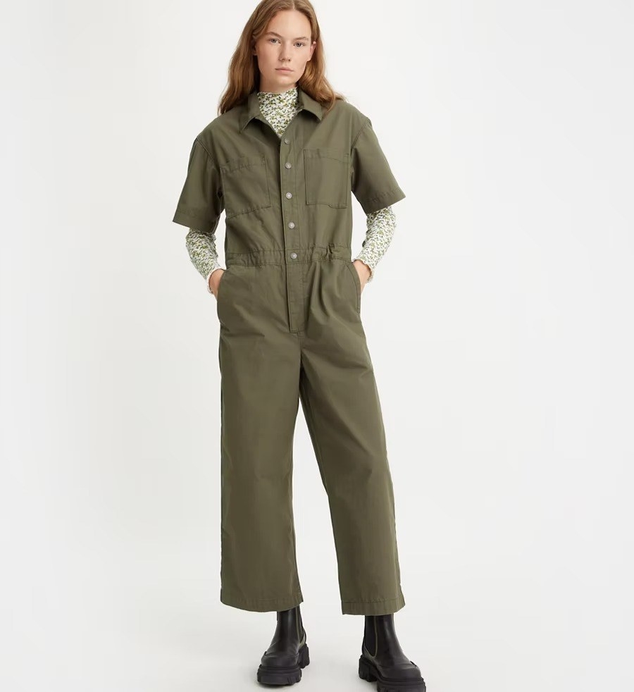 A model in the olive green workwear suit